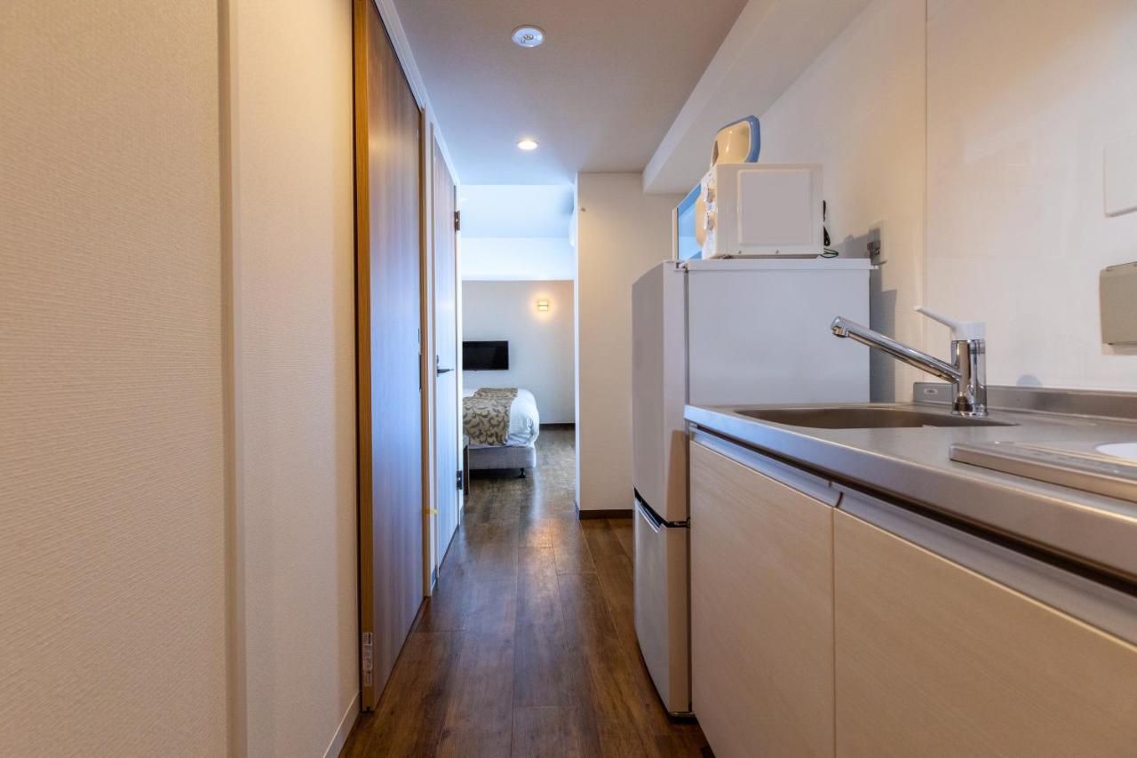 Mr Kinjo 万座ビーチ前 Aparthotel Onna Exterior photo