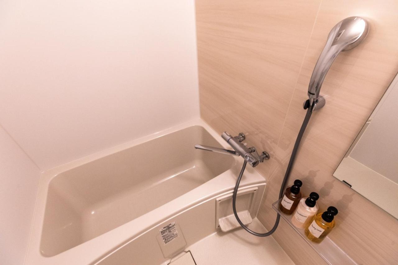 Mr Kinjo 万座ビーチ前 Aparthotel Onna Exterior photo