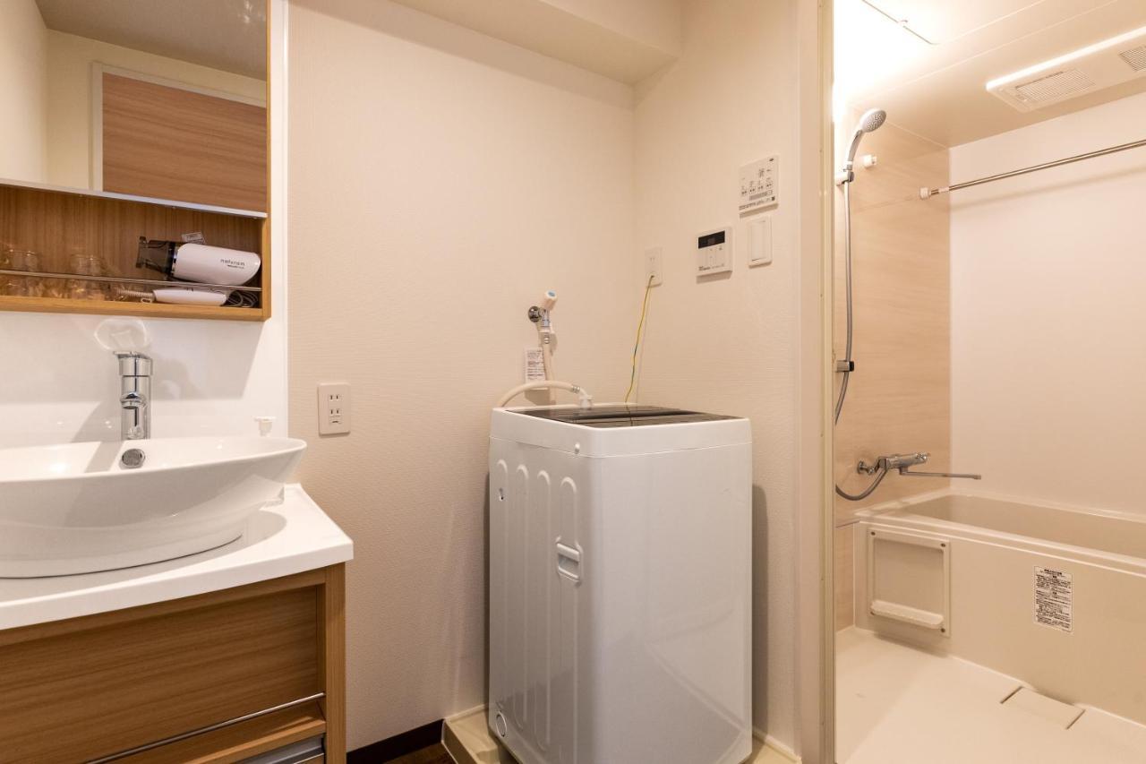 Mr Kinjo 万座ビーチ前 Aparthotel Onna Exterior photo